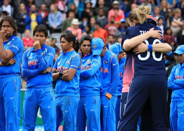 India look dejected before they are given their runners-up medals.