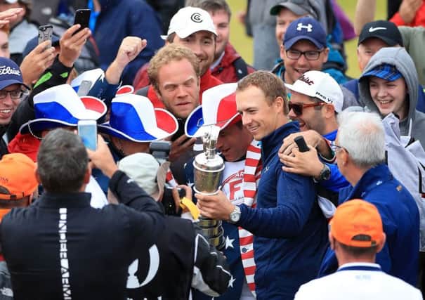 Jordan Spieth shows off the Claret Jug to a horde of admirers after his victory in the Open at Royal Birkdale (Picture: Andrew Matthews/PA Wire).