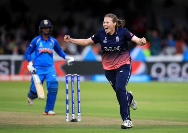 England's Anya Shrubsole celebrates the wicket of India's Deepti Sharma.