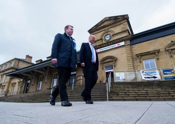 Antony Calvert, Conservative parliamentary candidate for Wakefield with Chris Grayling, Secretary of State for Transport, at Wakefield Kirkgate Station, one month before the election.