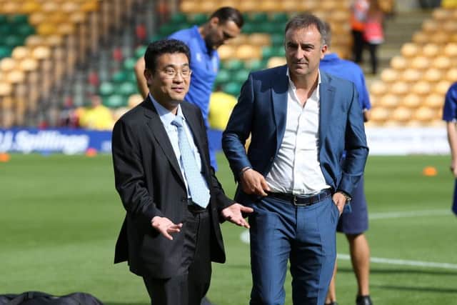 MAYBE THIS TIME? Sheffield Wednesday boss Carlos Carvalhal, right, with chairman Dejphon Chansiri. Picture: Steve Ellis