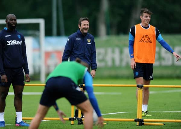 Leeds United's players train at the Jenbach Stadium in Austria as head coach Thomas Christiansen watches on. Picture: Jonathan Gawthorpe