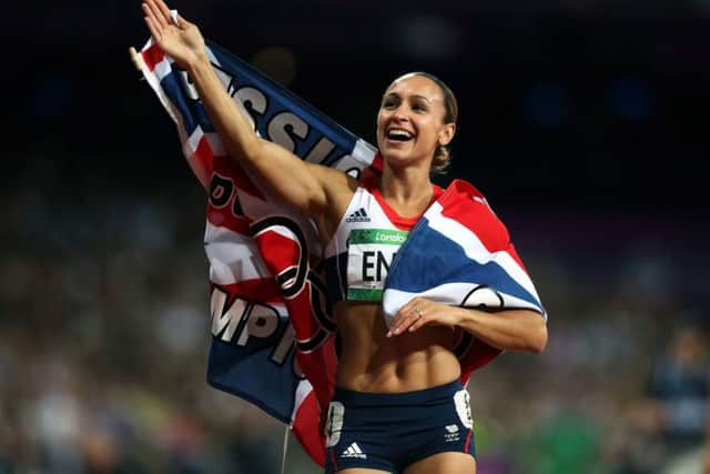 Great Britain's Jessica Ennis waves to the crowd after victory in the Heptathlon.