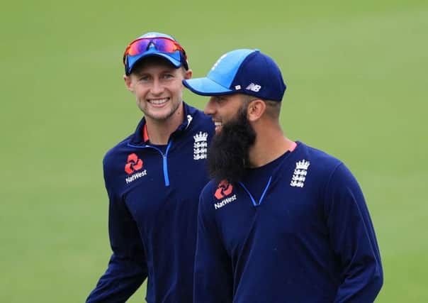 All smiles: Captain Joe Root and Moeen Ali share a joke during Englands final nets session ahead of todays third Test with South Africa at the Kia Oval. (Picture: John Walton/PA)