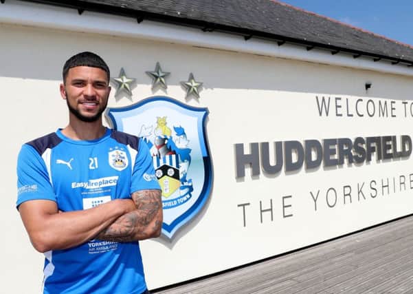 Huddersfield Town's Nahki Wells poses for a photo at PPG Canalside, Huddersfield ahead of the Championship play-off final (Picture: Simon Cooper/PA Wire)