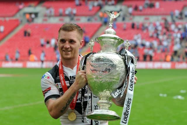 SAM AGAIN PLEASE: Marc Sneyd celebrates with the Challenge Cup last season..
 Picture: Jonathan Gawthorpe