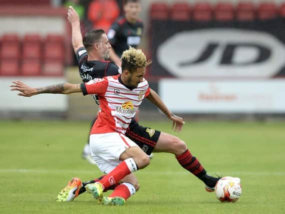 Alex Kiwomya in action against Doncaster Rovers for Crewe Alexandra last season.