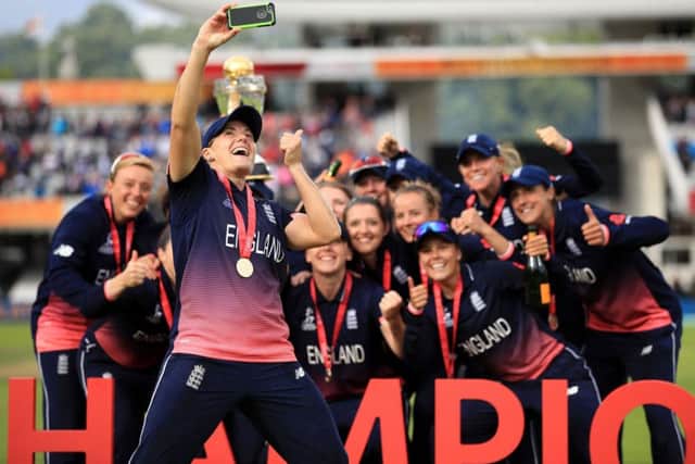 England's Katherine Brunt takes a selfie with the team as they celebrate with the trophy during the ICC Women's World Cup Final at Lord's, London. (Picture: John Walton/PA Wire)