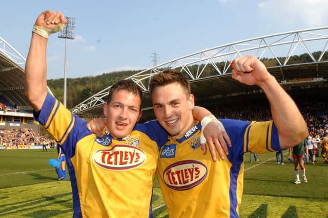 Danny McGuire and Kevin Sinfield celebrate Leeds Rhinos' Challenge Cup semi-final victory over St Helens in 2003.
