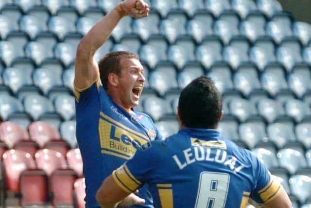 Danny McGuire and Kylie Leuluai celebrate Leeds Rhinos' Challenge Cup semi-final victory over St Helens in 2010.