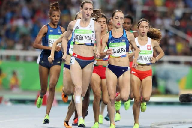 Great Britain's Laura Weightman and USA's Shannon Rowbury lead the women's 1,500m final at the Olympic Stadium on the eleventh day of the Rio Olympics Games, Brazil. (Picture: Martin Rickett/PA Wire)