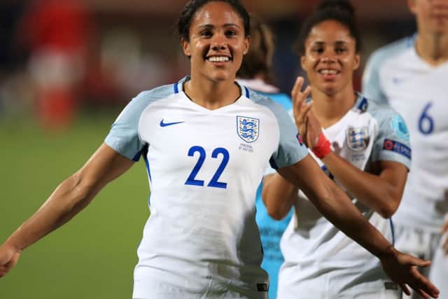 England's Alex Scott celebrates after the final whistle of her side's win over Portugal. Picture: Mike Egerton/PA