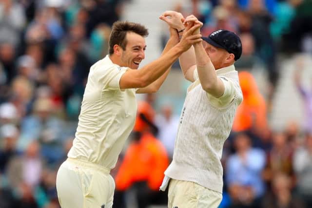 England's Toby Roland-Jones celebrates bowling out South Africa's Heino Kuhn. Picture: Adam Davy/PA.