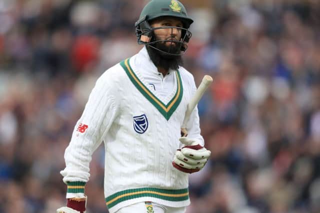 South Africa's Hashim Amla walks off after being bowled out by England's Toby Roland-Jones. Picture: Adam Davy/PA