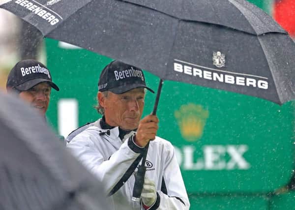 Germany's Bernhard Langer shelters under his umbrella on the first tee during the second round of the Senior Open Championship at Royal Porthcawl (Picture: Phil Inglis/Getty Images).