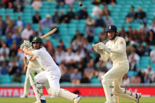 South Africa's Dean Elgar hits the ball away for four ruthrough the slip area as Jonny Bairstow watches on. Picture: Adam Davy/PA