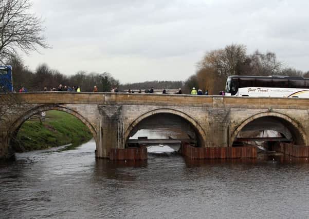 over the bridge: The LEP worked with local partners and government, not only to rebuild Tadcaster Bridge, but to widen it, making it easier to access the high street. Picture: PA Wire