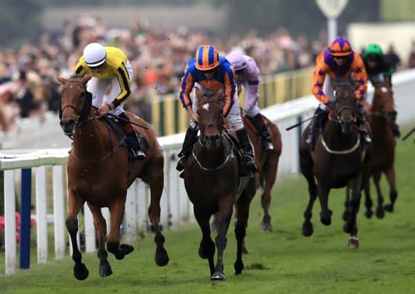 Big Orange, left, ridden by James Doyle, wins the Gold Cup during day three of Royal Ascot  in June (Picture: John Walton/PA Wire).