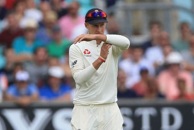 England's captain Joe Root successfully reviews for the wicket of South Africa's Temba Bavuma at The Oval. Picture: Nigel French/PA.