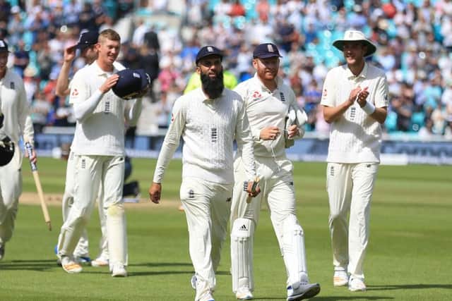 England's Moeen Ali (centre) is applauded off the field after his hat trick completed victory over South Africa. Picture: Nigel French/PA