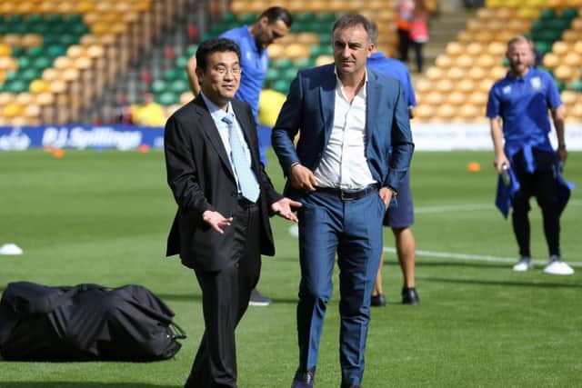 BIG YEAR: Sheffield Wednesday coach Carlos Carvalhal, right and the Owls' owner & chairman, Dejphon Chansiri, left. Picture: Steve Ellis.