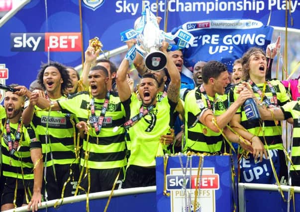 Huddersfield Town's players celebrate promotion to the Premier League at Wembley. Picture: Simon Hulme