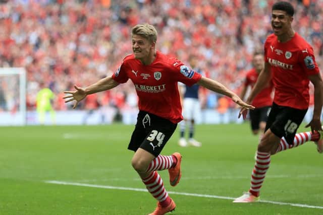 HELLO AGAIN: Lloyd Isgrove celebrates scoring Barnsley's third goal in the League One play-off final last year. He has returned to Oakwell on a permament basis. Picture: Nigel French/PA