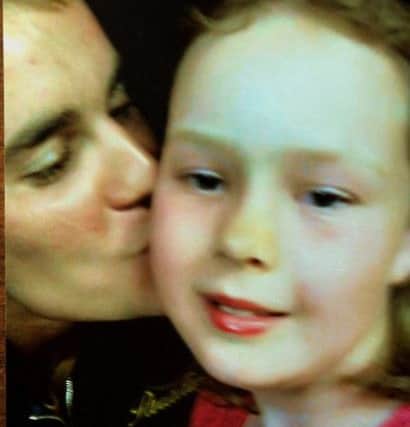 Ruby Varley 7 from Kippax near Leeds  gets a kiss from Justin Bieber.