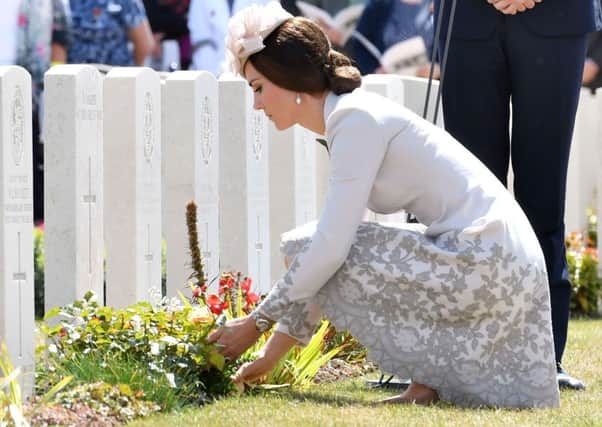 The Duchess of Cambridge lays flowers at the grave of the unknown soldier at Tyne Cot Commonwealth War Graves Cemetery in Ypres, Belgium, at a commemoration ceremony to mark the centenary of Passchendaele. Her ancestors hail from Leeds.