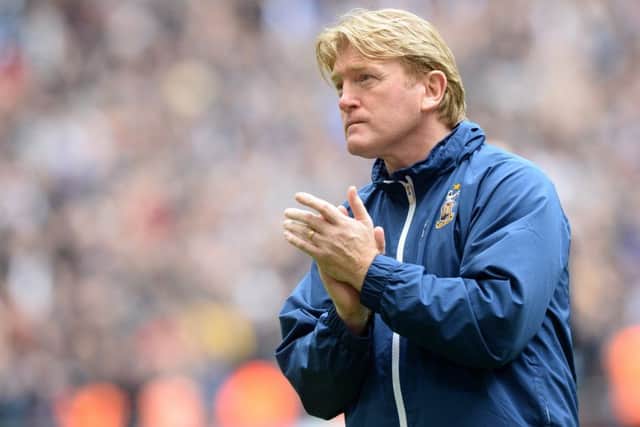 Stuart McCall applauds Millwall as they collect their play-off winners trophy.
 (Picture: Bruce Rollinson)