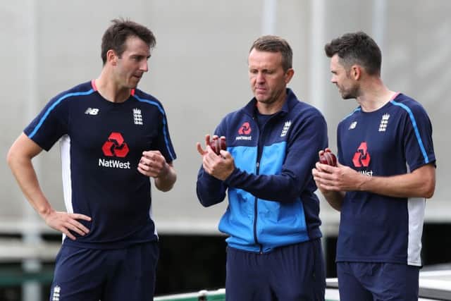 England's James Anderson (right), former player Dominic Cork (centre) and Toby Roland-Jones during the nets session at Emirates Old Trafford, Manchester. (Picture: Simon Cooper/PA Wire)
