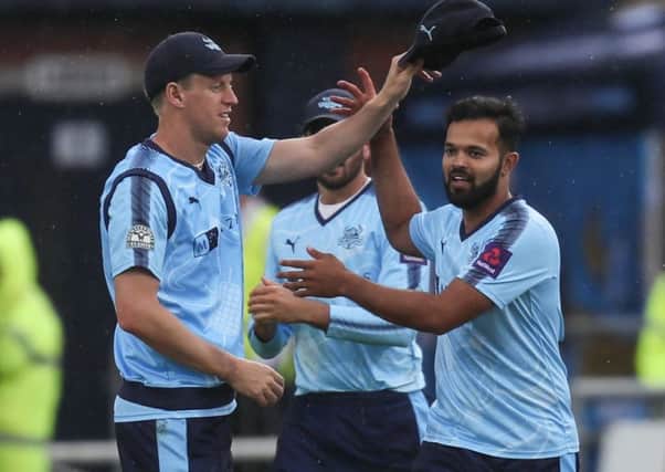 Yorkshire's Azeem Rafiq and Steve Patterson celebrates taking a wicket against Worcestershire in the T20 Blast last month. Picture: Paul Currie/SWpix.com