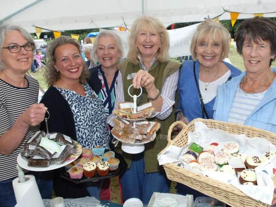 Ladies of Birstwith WI at the 150th show - Ann Rhodes, Ruth Fisher, Margaret Shepherd, Carol Packer, Syvia Chamberlain and Marion Stockdale at the cake stall.   (1707293AM)