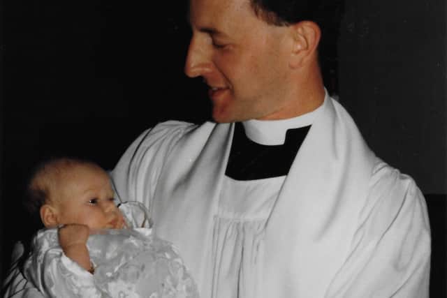 Scarlet Ribbons, by Rosemary Bailey   Simon baptising baby at Dinninton church