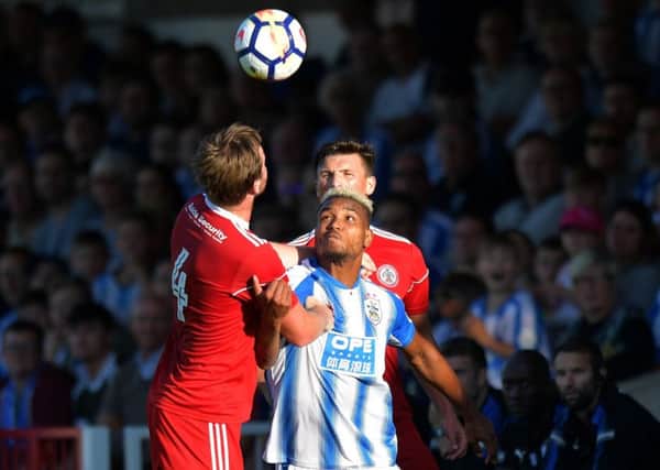 Huddersfield Town's Steve Mounie (centre) in action during the pre-season friendly at The Wham Stadium, Accrington. (Picture: Anthony Devlin/PA Wire)