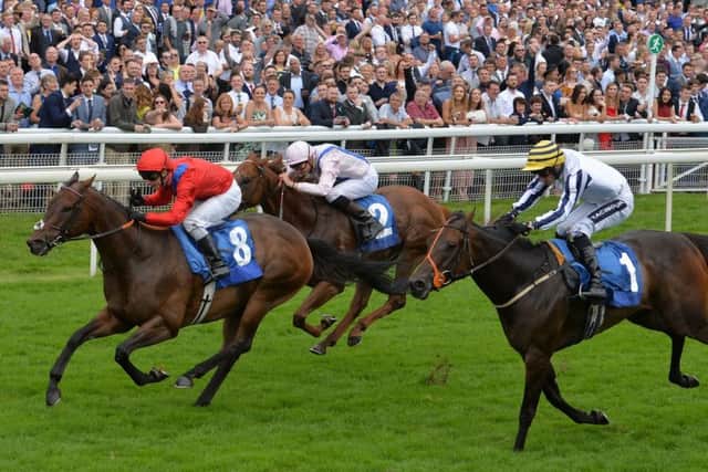 Take Cover ridden by David Allan wins the John Smith's City Wall Stakes at York last month.