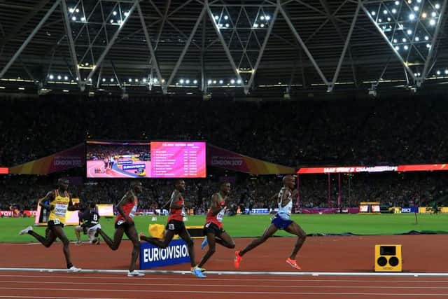 Catch me if you can: Britains Mo Farah surges into the lead en route to winning the mens 10,000m final during day one of the 2017 IAAF World Championships at the London Stadium. (Picture: John Walton/PA)