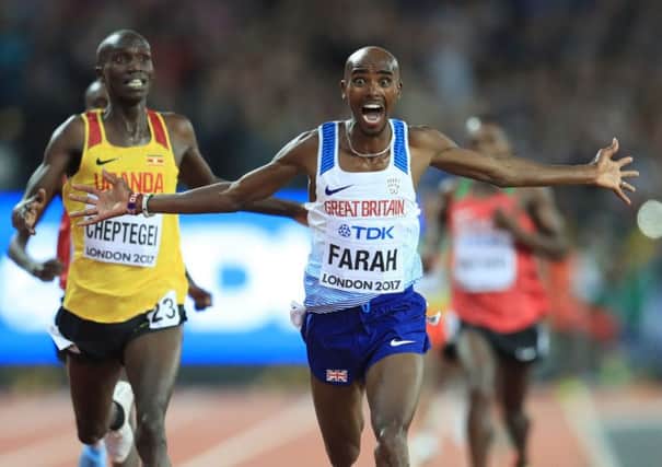 Mo Farah (right) celebrates taking gold in the 10,000m Men's Final during day one of the 2017 IAAF World Championships at the London Stadium. (Picture: Adam Davy/PA Wire)