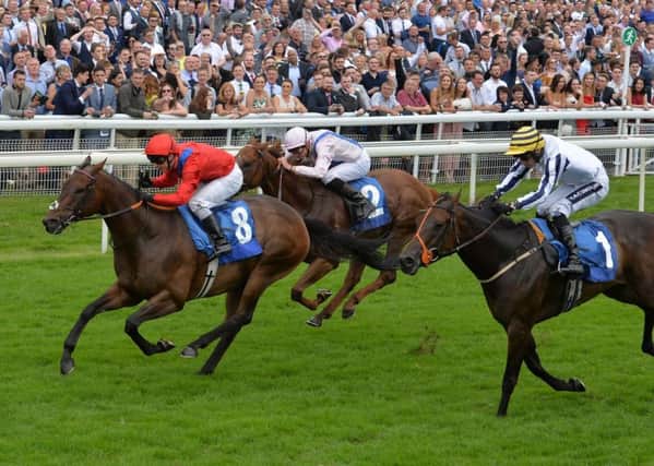 Take Cover pictured winning the John Smith's City Wall Stakes  at York in July (Picture: Anna Gowthorpe/PA Wire).