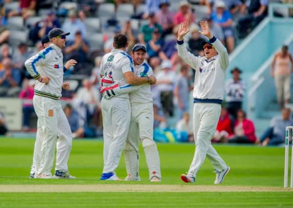 Tim Bresnan, (centre) of Yorkshire, celebrates with teammates, getting out Dan Lawrence, of Essex, by lbw (Picture: James Hardisty)
