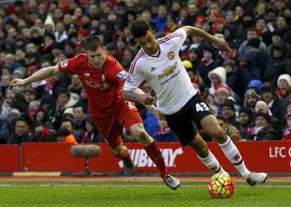 Manchester United's Cameron Borthwick-Jackson (right) is joining Leeds United online (Picture: PA)