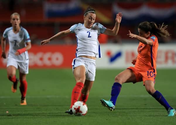 England's Lucy Bronze (left) and Netherland's Danielle van de Donk (right) battle for the ball during the UEFA Women's Euro 2017 match at the De Grolsch Veste, Enschede. PRESS ASSOCIATION Photo. Picture date: Thursday August 3, 2017. See PA story SOCCER England Women. Photo credit should read: Mike Egerton/PA Wire. RESTRICTIONS: Use subject to FA restrictions. Editorial use only. Commercial use only with prior written consent of the FA. No editing except cropping.