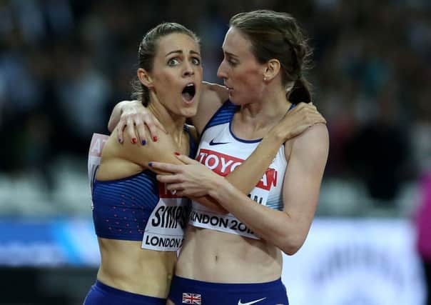 Great Britain's Laura Weightman (right) gestures to the scoreboard alongside second placed USA's Jennifer Simpson during day four of the 2017 IAAF World Championships at the London Stadium. (Picture: Martin Rickett/PA Wire)