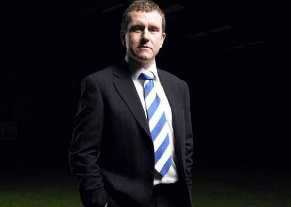 Reece Dinsdale admires Huddersfield Town boss Dean Hoyle.