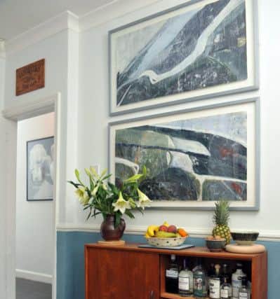 Vintage drinks cabinet and paintings by Lotte