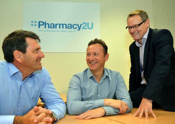 PARTNERSHIP: Mark Livingstone of Pharmacy 2U, Daniel Lee of Pharmacy 2U, with Richard Taylor of the BGF at the offices of Pharmacy 2U in Leeds.