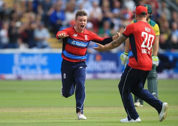 England's Mason Crane celebrates after taking the wicket of South Africa's AB De Villiers during the T20 match in Cardiff (Picture: Nigel French/PA Wire).