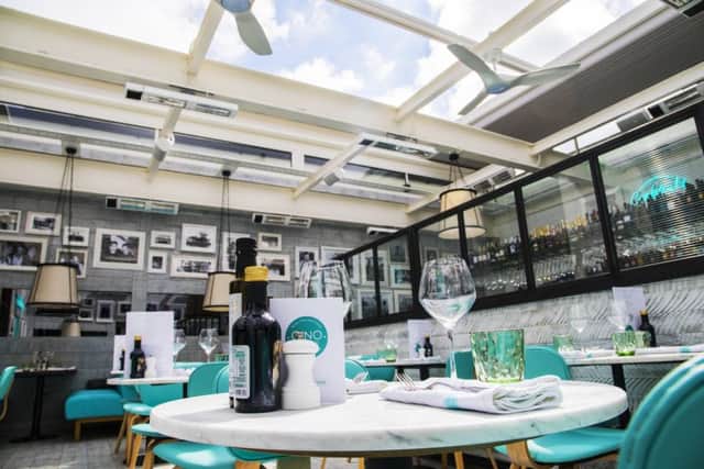 The spectacular openair terrace with roll-back roof at Gino's Harrogate.