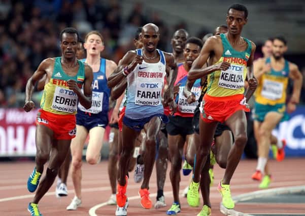 Boxed in: Mo Farah has company from two of the Ethiopian trio who will threaten him in tonights final  Muktar Edris, Yomif Kejelcha  in Wednesday nights 5,000m heat.