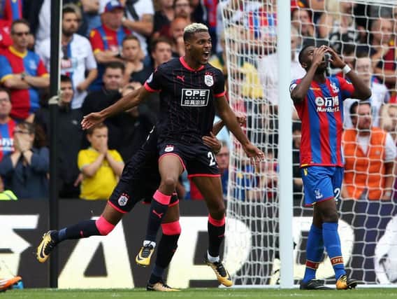 Steve Mounie celebrates his first goal of the afternoon at Selhurst Park (Photo: PA)